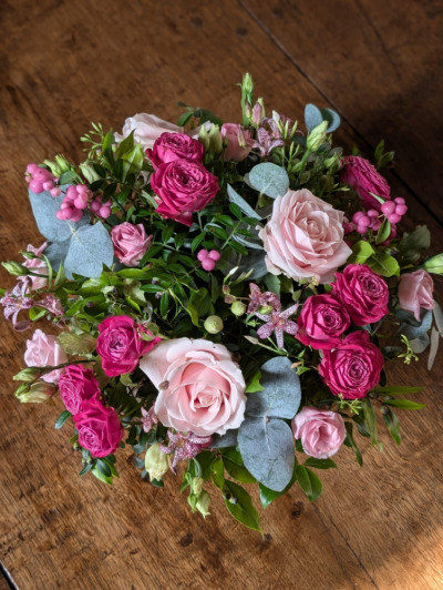 Pink Rose - A beautifully handcrafted posy featuring soft and vibrant pink tones with seasonal flowers and fresh foliage, perfect for adding a touch of elegance to any space.